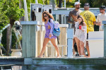 Shakira enjoys a barefoot trip with a boatload of male pals in Miami as rumors swirl over possible Tom Cruise romance.