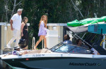 Shakira enjoys a barefoot trip with a boatload of male pals in Miami as rumors swirl over possible Tom Cruise romance.