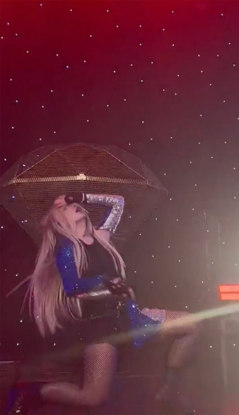 Ava Max is slapped in the face by a fan while performing onstage during her concert in Los Angeles, CA.