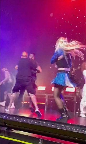 Ava Max fan hauled off stage after appearing to slap the singer during her concert in Los Angeles, CA.