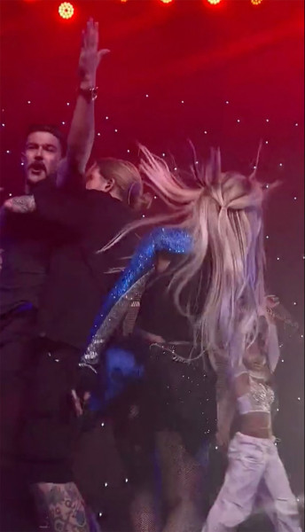 Ava Max is slapped in the face by a fan while performing onstage during her concert in Los Angeles, CA.