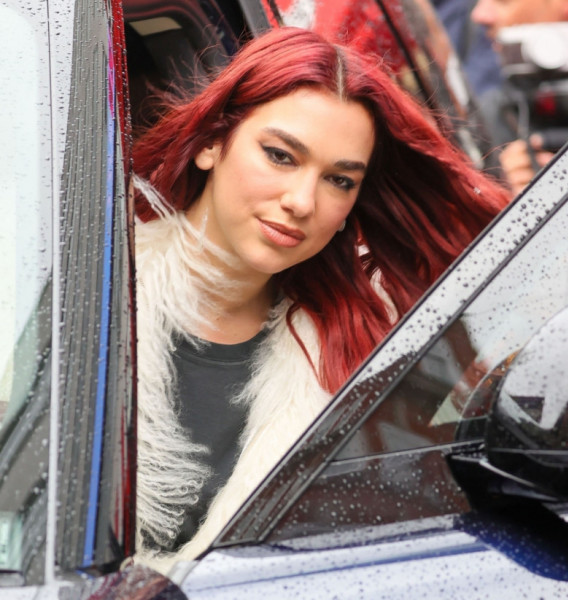 The British Singer Dua Lipa shows off her red locks outside the Capital breakfast show in London.