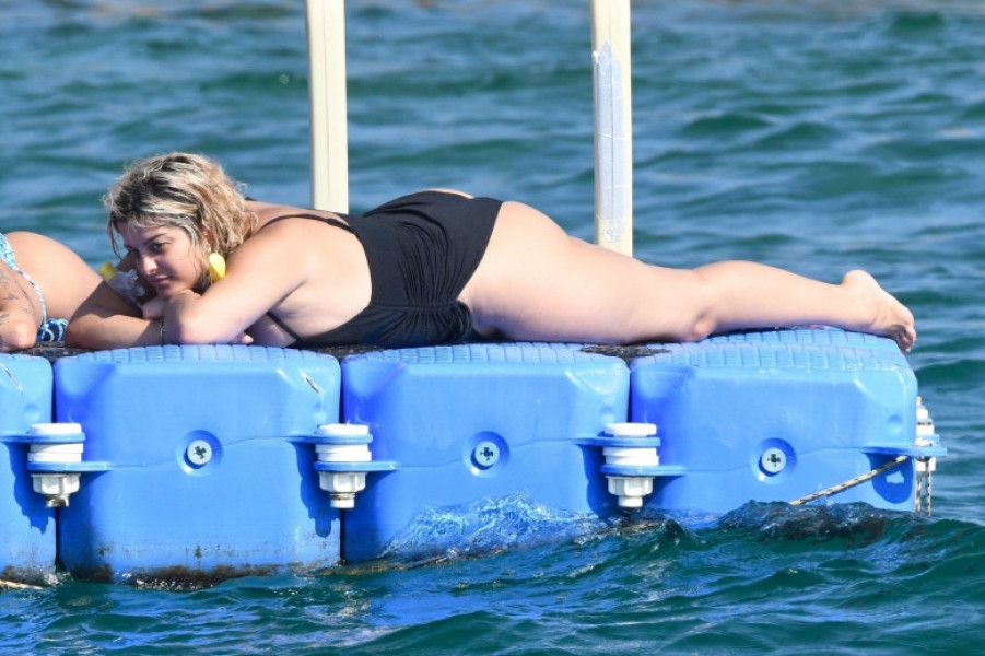 *PREMIUM-EXCLUSIVE* MUST CALL FOR PRICING BEFORE USAGE  - The American Singer Bebe Rexha packs on PDA with her new boyfriend, the Architectural Engineer Simos Liakos as the pair took to the waters with a passionate display during their sun-soaked holiday