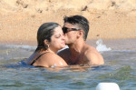 *PREMIUM-EXCLUSIVE* MUST CALL FOR PRICING BEFORE USAGE  - The American Singer Bebe Rexha packs on PDA with her new boyfriend, the Architectural Engineer Simos Liakos as the pair took to the waters with a passionate display during their sun-soaked holiday