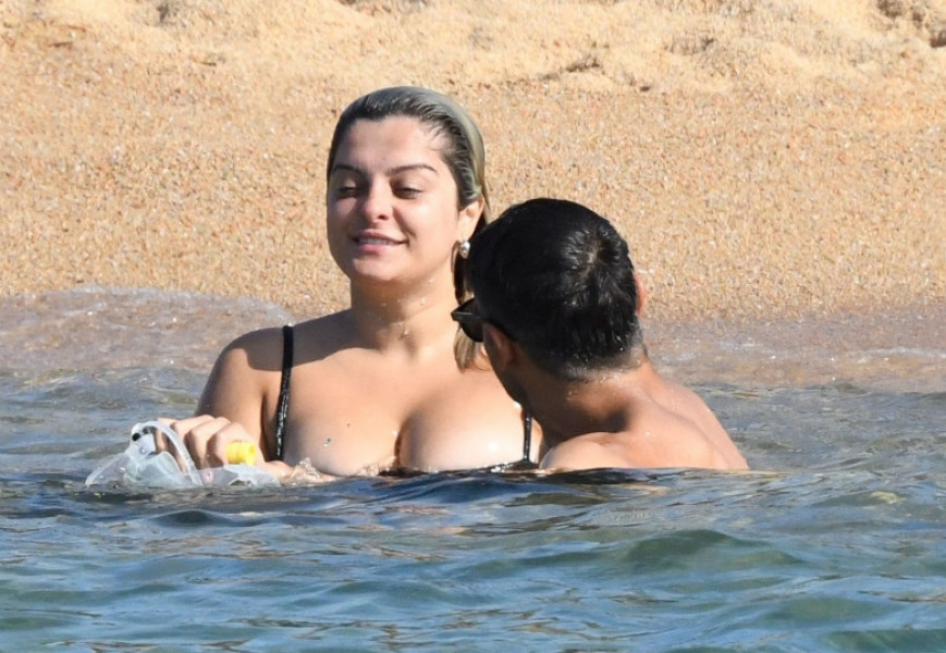 *PREMIUM-EXCLUSIVE* MUST CALL FOR PRICING BEFORE USAGE  - The American Singer Bebe Rexha packs on PDA with her new boyfriend, the Architectural Engineer Simos Liakos as the pair took to the waters with a passionate display during their sun-soaked holiday