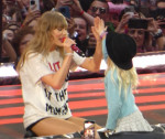 Taylor Swift Gifts Hat To Young Fan During Eras Tour At Wembley Stadium - 15 Aug 2024