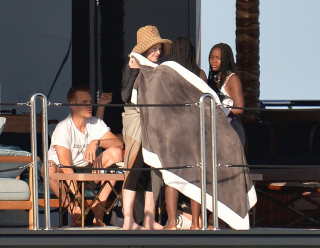 *PREMIUM-EXCLUSIVE* MUST CALL FOR PRICING BEFORE USAGE  - The 'Queen of Pop' Madonna continues to lap up the summer sunshine on her Italian holiday in Ponza as the legendary American singer is seen out to sea on her luxury yacht with boyfriend Akeem Morri