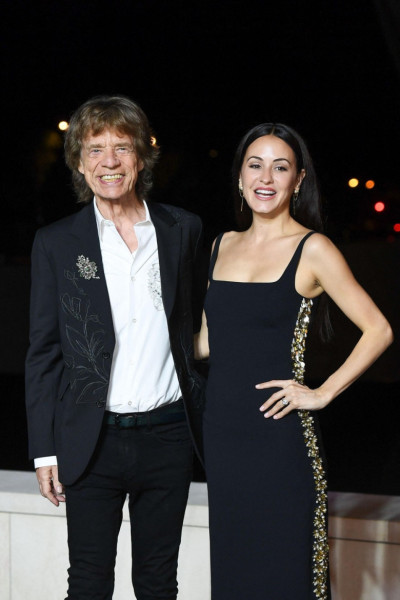 Paris, France. 25th July, 2024. Mick Jagger and Melanie Hamrick attending The Prelude to The Paris Games 2024 at the Vuitton Foundation in Paris, France on July 25, 2024. Photo by Aurore Marechal/ABACAPRESS.COM Credit: Abaca Press/Alamy Live News