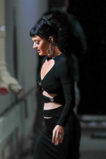 Katy Perry makes a striking entrance at Kimmel Live in a black cut-out dress