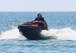 *EXCLUSIVE* Italian tenor Andrea Bocelli enjoys a little fun in the sun with a thrill seeking jet skiing ride during his sun soaked holidays with his wife Veronica Berti in Forte dei Marmi, Italy.