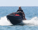 *EXCLUSIVE* Italian tenor Andrea Bocelli enjoys a little fun in the sun with a thrill seeking jet skiing ride during his sun soaked holidays with his wife Veronica Berti in Forte dei Marmi, Italy.