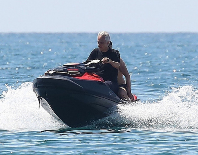 *EXCLUSIVE* Italian tenor Andrea Bocelli enjoys a little fun in the sun with a thrill seeking jet skiing ride during his sun soaked holidays with his wife Veronica Berti in Forte dei Marmi, Italy.