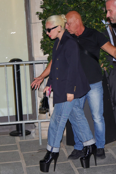Lady Gaga returns to her hotel around 1 a.m. wearing high heels and white paint on her fingers