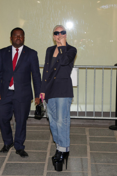 Lady Gaga returns to her hotel around 1 a.m. wearing high heels and white paint on her fingers