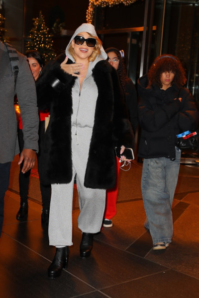 *EXCLUSIVE* Mariah Carey is all smiles while leaving her hotel in NYC