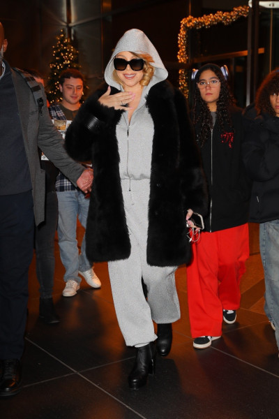 *EXCLUSIVE* Mariah Carey is all smiles while leaving her hotel in NYC