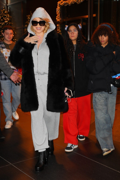 *EXCLUSIVE* Mariah Carey is all smiles while leaving her hotel in NYC