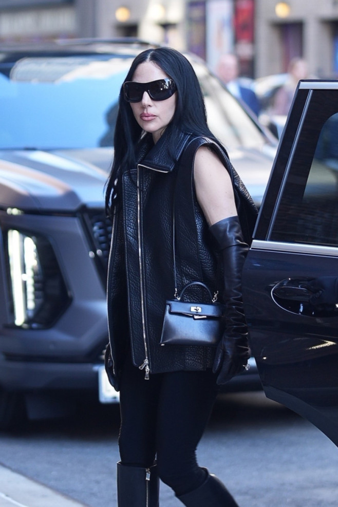 Lady Gaga arrives at the Stephen Colbert Show in rockstar mode