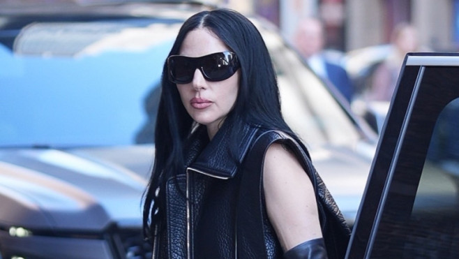 Lady Gaga arrives at the Stephen Colbert Show in rockstar mode