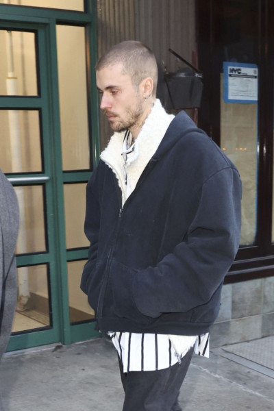 Justin Bieber arrives at Bar Pitti shortly after Hailey’s departure