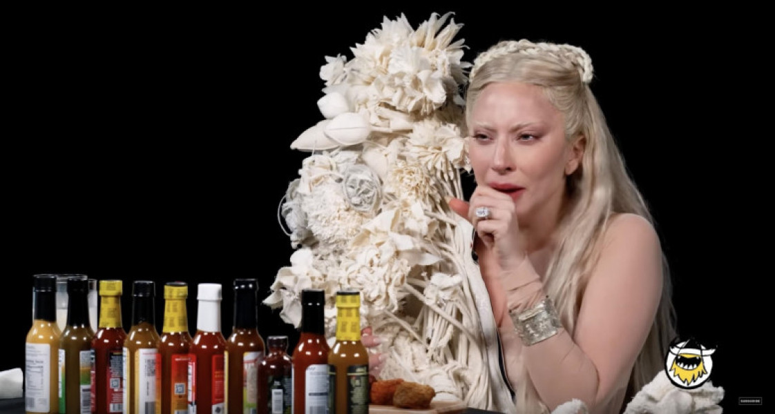 Lady Gaga tries to keep a Poker Face as she takes on spicy chicken wings as she appears on Hot Ones