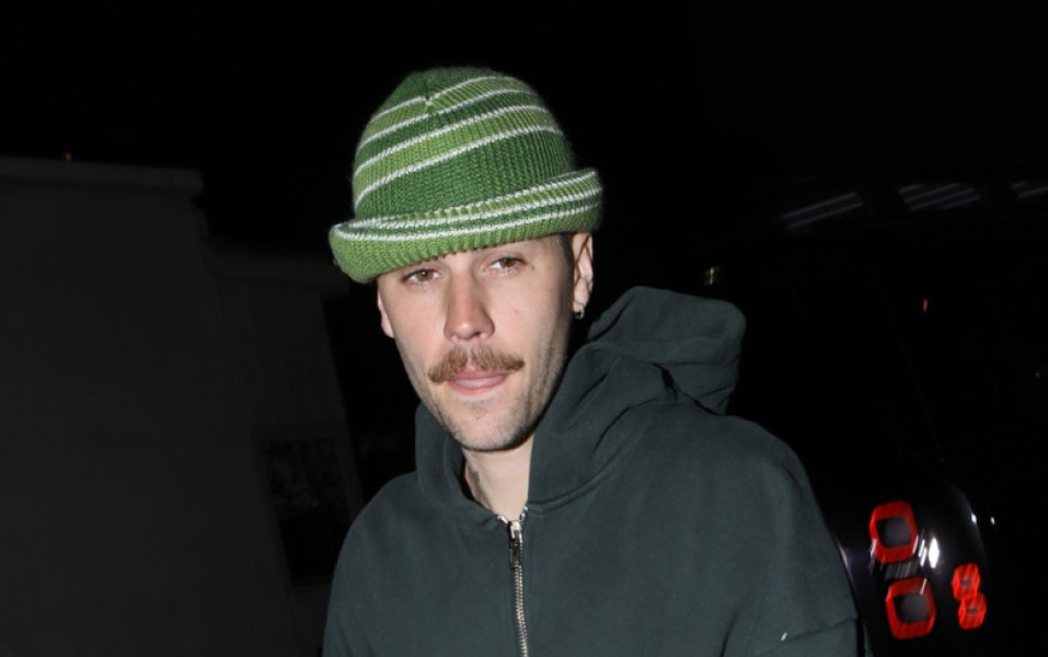 PREMIUM EXCLUSIVE Justin Bieber showing off his moustache at burger restaurant