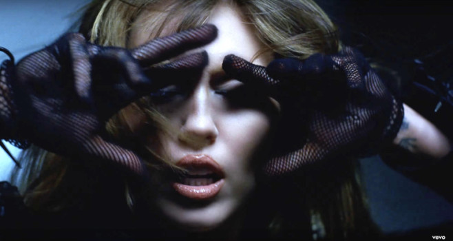 Miley Cyrus and Naomi Campbell steam up the screen as they strip off and strike a pose in Every Girl You've Ever Loved music video