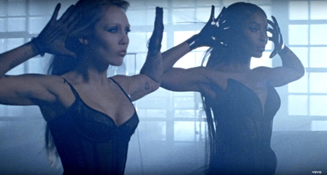Miley Cyrus and Naomi Campbell steam up the screen as they strip off and strike a pose in Every Girl You've Ever Loved music video
