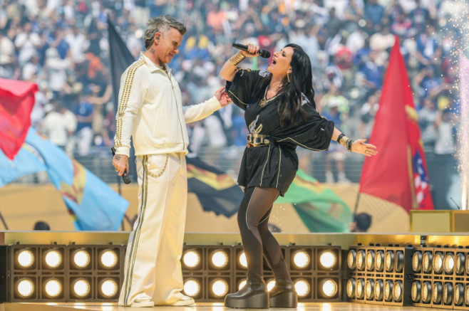 Robbie Williams and Laura Pausini perform before the FIFA Club World Cup 2025 final match between Chelsea FC and Paris Saint-Germain at MetLife Stadium on July 13, 2025 in East Rutherford, New Jersey.