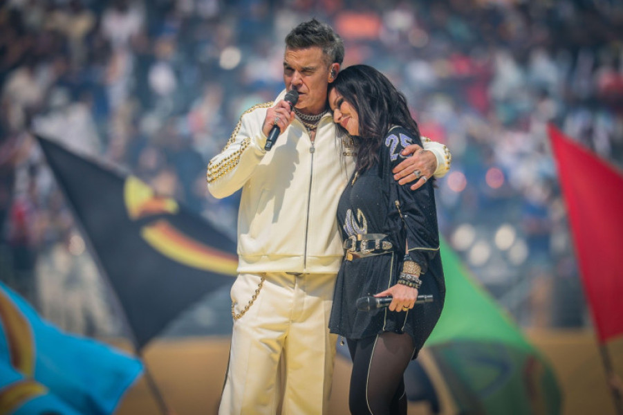 Robbie Williams and Laura Pausini perform before the FIFA Club World Cup 2025 final match between Chelsea FC and Paris Saint-Germain at MetLife Stadium on July 13, 2025 in East Rutherford, New Jersey.