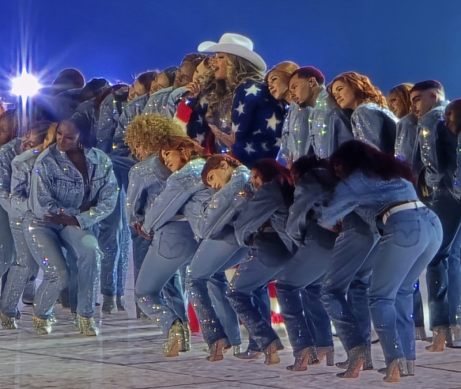 Beyonce tosses American Flag costume on the stage behind her to reveal sexy fitted costume during final weekend of concert tour in Las Vegas