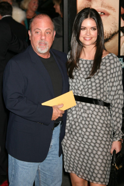 Billy Joel and wife Katie Lee Joel attend the premiere of "The Departed" at the Ziegfeld Theatre in New York City on September 26, 2006.  Photo Credit: Henry McGee/MediaPunch