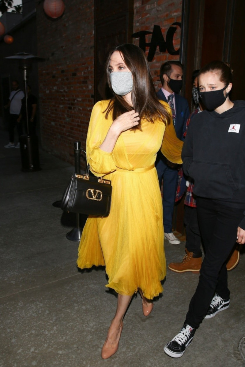 *PREMIUM-EXCLUSIVE* Angelina Jolie looks stunning in a yellow dress as she steps out for dinner at TAO on her 46th birthday