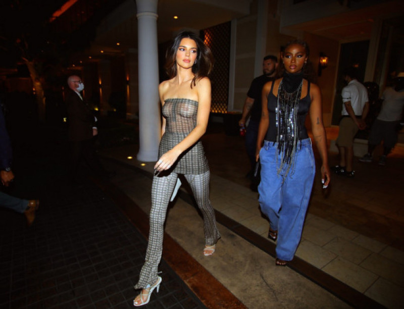 EXCLUSIVE: Kendall Jenner is seen heading to Delilah grand opening in see thru dress in Las Vegas with friend Justine Skye