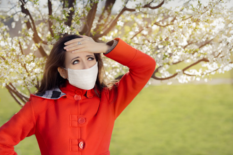 Woman,With,Allergy,With,Respirator,Mask,In,Spring,Blooming,Decor