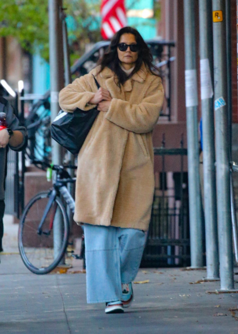 *EXCLUSIVE* Katie Holmes opts for fuzzy trench coat during a chilly Monday stroll in New York City