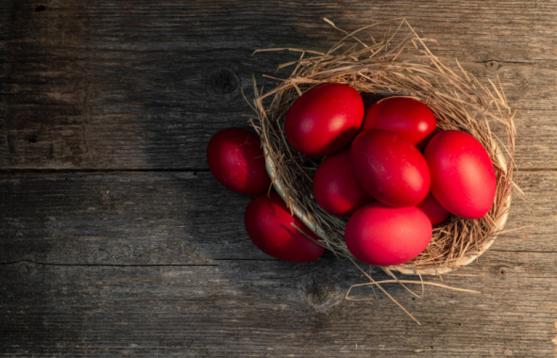 Easter,Eggs,Painted,In,Red,Color,On,A,Wooden,Background.