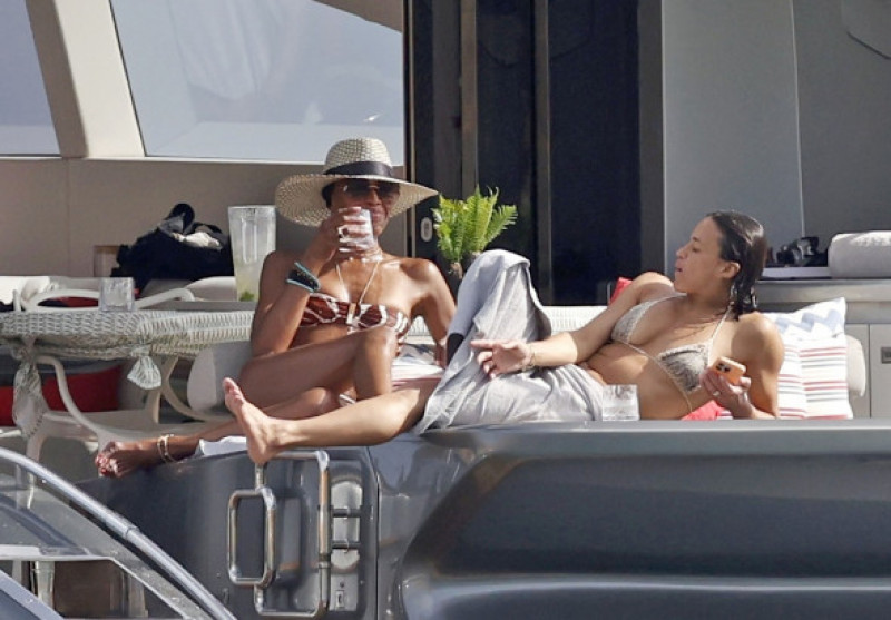 *PREMIUM-EXCLUSIVE* MUST CALL FOR PRICING BEFORE USAGE - Topping up their tans by showing off their sultry figures, It's fun in the sun for Naomi Campbell, Michelle Rodriguez, Eisa Gonzalez and Afef Jnifen out on holiday in Ibiza.*PICTURES TAKEN ON 09/