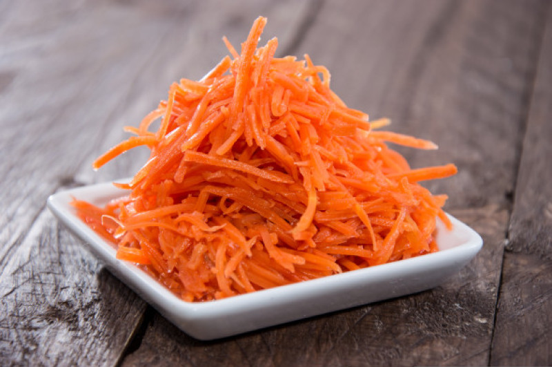 Small,Plate,With,Carrot,Salad,On,Wooden,Background