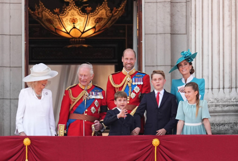 (left to right) Queen Camilla, King Charles III, Prince Louis, the Prince of Wales, Prince George, the Princess of Wales and Princess Charlotte on the balcony of Buckingham Palace, London, to view the flypast following, the Trooping the Colour ceremony in