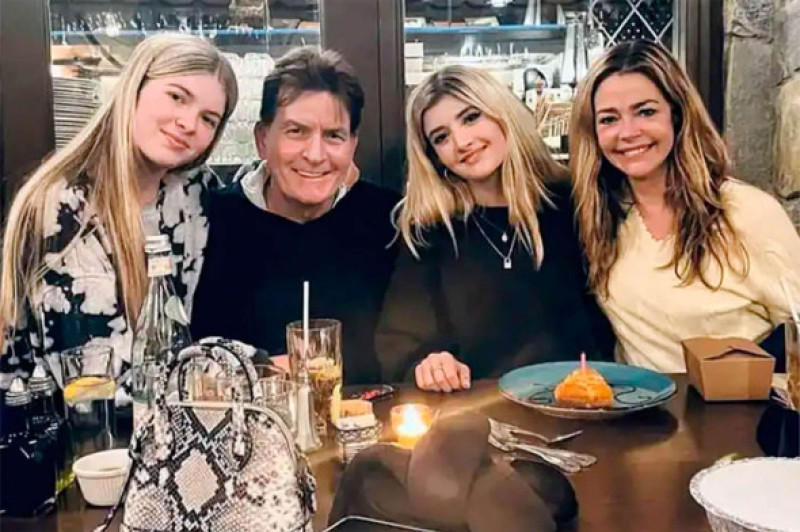 Lola Sheen, Charlie Sheen, Sami Sheen and Denise Richards in 2021.