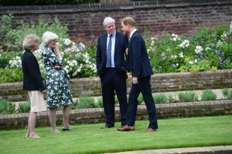 (left to right) Lady Sarah McCorquodale, Lady Jane Fellowes and Earl Spencer, with their nephew the Duke of Sussex during the unveiling of a statue they commissioned of hismother Diana, Princess of Wales, in the Sunken Garden at Kensington Palace, London,