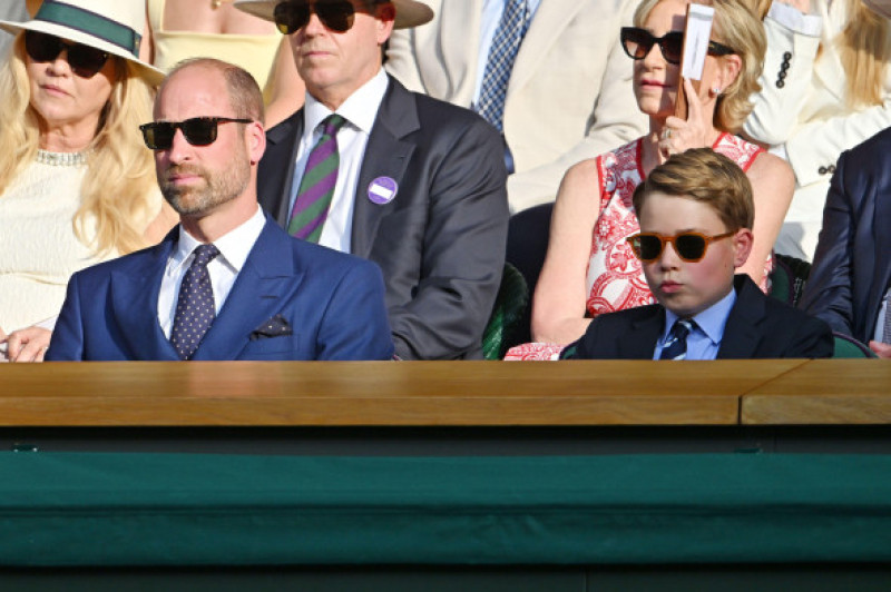 LONDON, UNITED KINGDOM - July 13: , HRH William, The Prince of Wales and HRH Prince George attend the men’s singles tennis finals on centre court during day fourteen of the 2025 Wimbledon Championships at The All England Lawn Tennis and Croquet Club in W