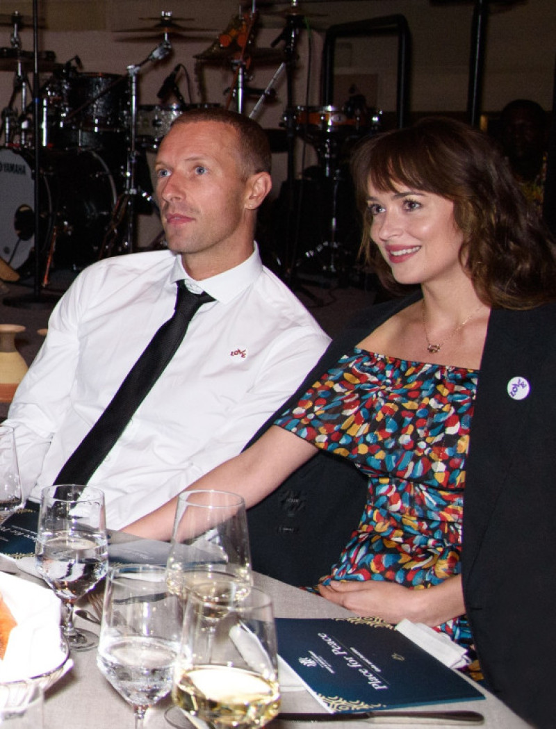 EXCLUSIVE: Chris Martin and Dakota Johnson Attend "Place for Peace" Event