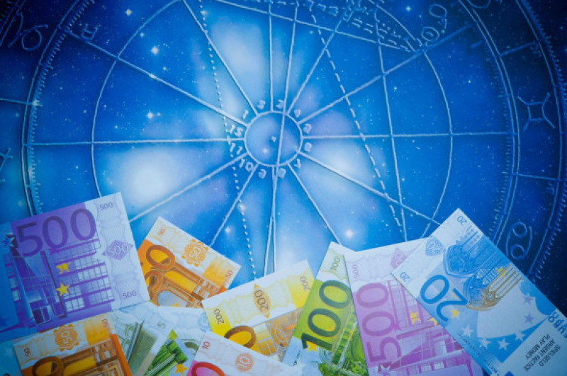 euro and astrology, horoscope for money concept