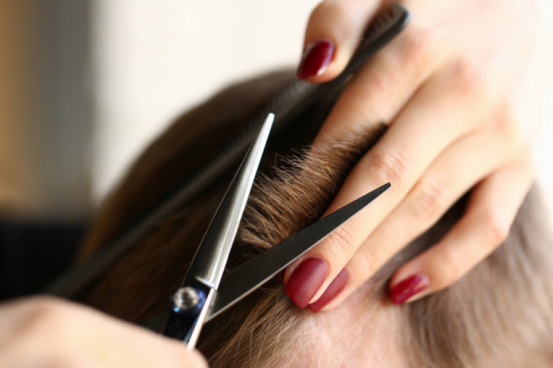 Female hand hold hair scissors hairdresser