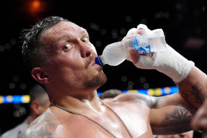 Oleksandr Usyk drinks water after winning their IBF, IBO, WBC and WBO World heavyweight bout against Daniel Dubois at Wembley Stadium, London. Picture date: Saturday July 19, 2025.
