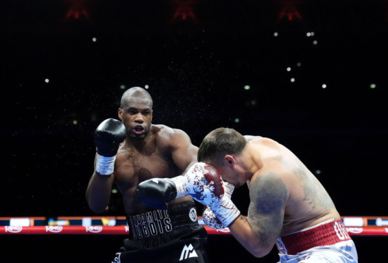 Oleksandr Usyk and Daniel Dubois (left) in action during their IBF, IBO, WBC and WBO World heavyweight bout at Wembley Stadium, London. Picture date: Saturday July 19, 2025.