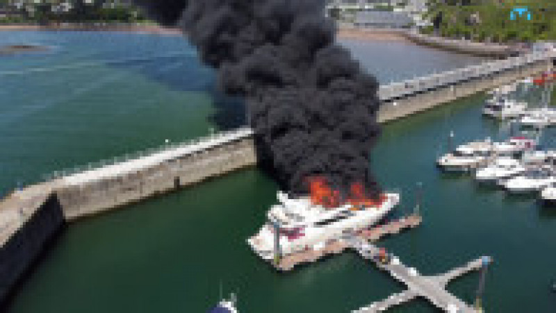 Un super-iaht a luat foc și s-a scufundat într-un port din Anglia Foto: Profimedia Images | Poza 1 din 14
