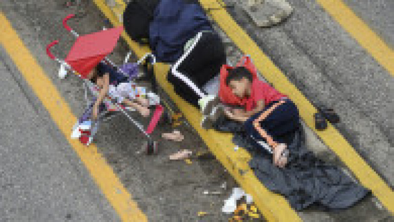 Latin American migrants taking part in a caravan towards the border with the United States, sleep in Huehuetan, Chiapas state, Mexico, on June 7, 2022. President Joe Biden